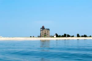 Cedar Point Lighthouse as seen from a rental jet ski during an around shelter island tour in long island