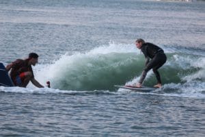 Wakesurfing wave behind peconic water sports boutique in the hamptons