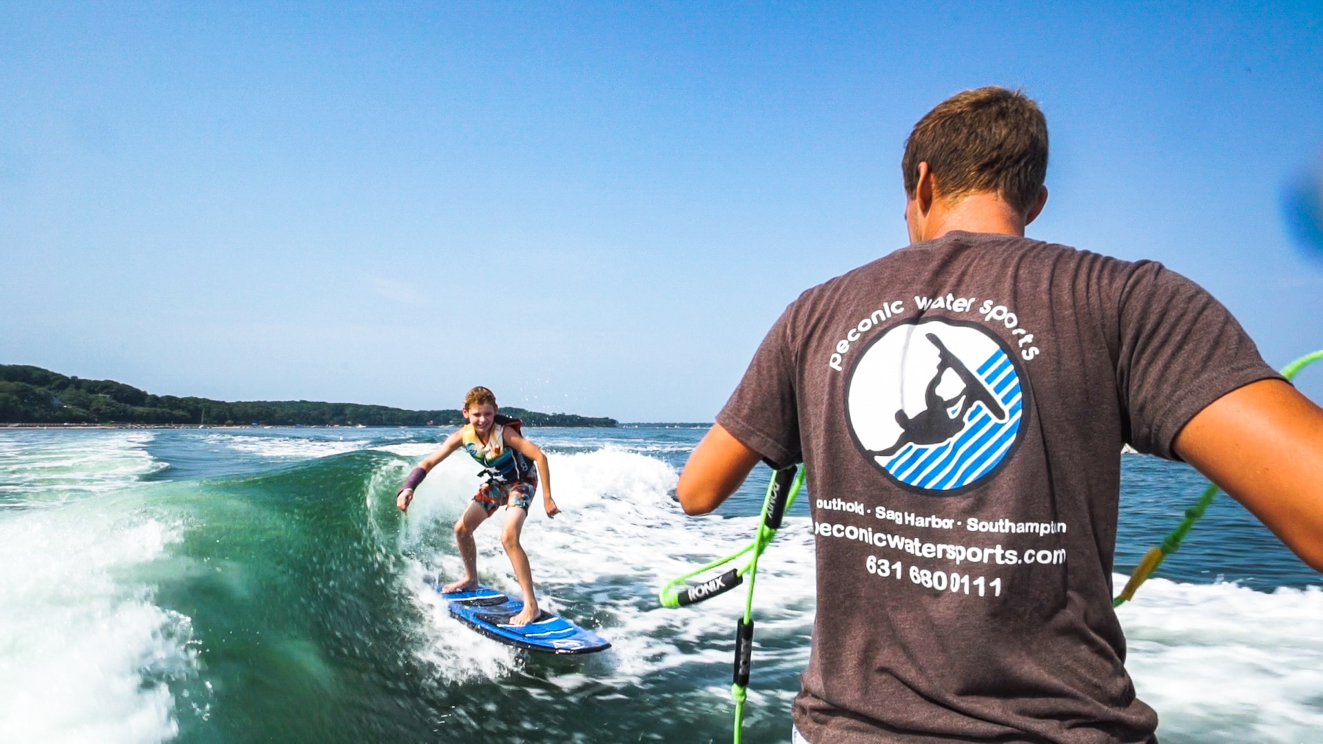 Wakesurfing in Montauk with Peconic Water Sports on a Malibu Wakeboard Boat